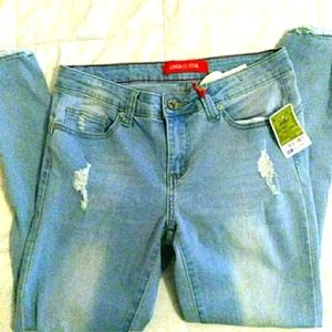 New sz: 5 distressed light blue denim skinny jeans